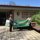 Rangers at Hopewell Culture NHP in Ohio proudly display the NPOTA banner they purchased for visiting Amateur Radio operators to use Hopewell_NPSRangers.jpg